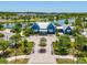 Stunning community clubhouse with beautiful architecture and landscaping, perfect for gatherings at 18219 Ramble On Way, Land O Lakes, FL 34638