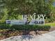 Bexley Club entrance sign surrounded by lush landscaping, creating a welcoming and upscale community entrance at 18219 Ramble On Way, Land O Lakes, FL 34638