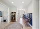 Inviting hallway boasting tile flooring, bench seating, and stylish decorations at 18219 Ramble On Way, Land O Lakes, FL 34638