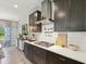Well-equipped kitchen featuring ample countertop space, modern appliances, and stylish backsplash at 18219 Ramble On Way, Land O Lakes, FL 34638