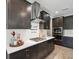 A gourmet kitchen featuring stainless steel appliances, gas cooktop and stylish white countertops at 18219 Ramble On Way, Land O Lakes, FL 34638