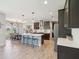 Contemporary kitchen featuring stainless steel appliances, island with seating, and sleek countertops at 18219 Ramble On Way, Land O Lakes, FL 34638