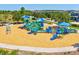 Brightly colored playground with multiple slides and climbing structures, perfect for active and outdoor fun at 18219 Ramble On Way, Land O Lakes, FL 34638