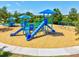 Playground featuring swings, slides and climbing structures, offering a fun play area for children and families at 18219 Ramble On Way, Land O Lakes, FL 34638