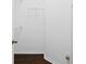 View of an interior closet featuring hardwood floors, white walls and wire shelving at 19407 Sweet Grass Way, Lutz, FL 33558