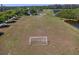 View of a well-maintained community soccer field with goals and ample space for recreational activities at 19407 Sweet Grass Way, Lutz, FL 33558