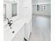 Bright and modern bathroom featuring a large vanity with brushed metal faucet at 201 W Laurel St # 504B, Tampa, FL 33602