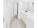 Bright bathroom featuring modern fixtures, sleek vanity, and walk-in shower, perfect for a refreshing experience at 201 W Laurel St # 504B, Tampa, FL 33602