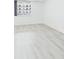 Empty bedroom with neutral paint, modern window and light-colored, wood-look flooring at 201 W Laurel St # 504B, Tampa, FL 33602