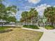Picturesque park view with sidewalks, trees, and a waterfront promenade under a sunny sky at 201 W Laurel St # 504B, Tampa, FL 33602