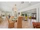 Open concept dining area leading into the living room and kitchen at 206 Corbett St, Belleair, FL 33756
