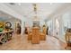 Dining room with a glass table and views of the home's entryway at 206 Corbett St, Belleair, FL 33756