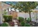 Cozy shed situated in a well maintained garden area, perfect for storage and outdoor projects at 206 Corbett St, Belleair, FL 33756