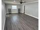 Spacious bedroom featuring modern gray walls and sleek dark flooring at 2205 N Grady Ave, Tampa, FL 33607