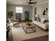 Bright living room featuring neutral tones, wood-look flooring, ceiling fan and ample natural light at 2205 N Grady Ave, Tampa, FL 33607