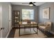 Bright and cozy office featuring a desk, chair, and shelving for storage at 2205 N Grady Ave, Tampa, FL 33607