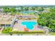 Aerial view of the community pool, clubhouse, and recreation areas at 2231 Utopian E Dr # 117, Clearwater, FL 33763