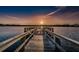 Scenic view from the fishing dock over the water at sunset at 2231 Utopian E Dr # 117, Clearwater, FL 33763