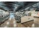 Bright fitness center featuring modern cardio equipment and wood flooring at 2231 Utopian E Dr # 117, Clearwater, FL 33763