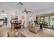 Open concept floor plan with living room, dining room, and kitchen at 2506 Laurelwood Dr # 4C, Clearwater, FL 33763