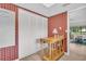 Neutral-toned room featuring wall to wall plaid and white closet doors at 2506 Laurelwood Dr # 4C, Clearwater, FL 33763