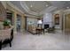 Bright living room with fireplace and french doors at 2680 Keystone Springs Rd, Tarpon Springs, FL 34688