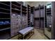 Spacious walk-in closet with custom shelving, drawers, and ample storage space at 2680 Keystone Springs Rd, Tarpon Springs, FL 34688