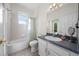 Functional bathroom with a bathtub, shower, and vanity, designed for everyday use at 27338 Hollybrook Trl, Wesley Chapel, FL 33544