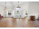 Spacious foyer with wood floors, high ceilings, and decorative lighting at 27338 Hollybrook Trl, Wesley Chapel, FL 33544