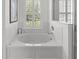 Bright bathroom with large tub and shower at 29432 Coharie Loop, San Antonio, FL 33576