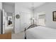 Bright bedroom with white walls, carpet, and closet space at 29432 Coharie Loop, San Antonio, FL 33576
