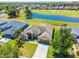 Lovely single Gathering home with a well-manicured lawn and a peaceful view of the community golf course at 29432 Coharie Loop, San Antonio, FL 33576