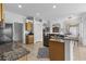 Spacious kitchen with granite countertops, stainless steel appliances, and ample cabinet space for storage at 29432 Coharie Loop, San Antonio, FL 33576