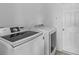 Laundry room with washer and dryer at 29432 Coharie Loop, San Antonio, FL 33576