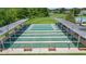 Community shuffleboard courts offer shaded seating and well-maintained playing surfaces for enjoyable recreation at 29432 Coharie Loop, San Antonio, FL 33576