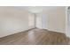 Bedroom featuring wood floors, a ceiling fan, and a closet at 3114 W Barcelona St, Tampa, FL 33629