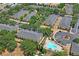 Aerial view of the community, showcasing the pool and well-maintained grounds at 3437 Dragon View Ct, Valrico, FL 33594