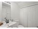 This bathroom has a white vanity and an enclosed toilet area at 3437 Dragon View Ct, Valrico, FL 33594