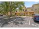 Townhouse exterior featuring reserved parking and well-kept landscaping at 3437 Dragon View Ct, Valrico, FL 33594