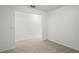 Bright room featuring neutral carpet and white walls at 3437 Dragon View Ct, Valrico, FL 33594