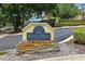 Kings Mill Townhomes sign with attractive stacked stone and professional landscaping at 3437 Dragon View Ct, Valrico, FL 33594