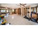 Open-concept living space mid-renovation, highlighting the original flooring and exposed framework at 3962 Poinsettia Dr, St Pete Beach, FL 33706
