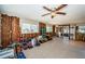 Spacious living room undergoing renovations, revealing the framework and original terrazzo flooring at 3962 Poinsettia Dr, St Pete Beach, FL 33706