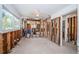 Open living space featuring terrazzo floors and large windows at 3962 Poinsettia Dr, St Pete Beach, FL 33706