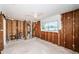 Spacious main bedroom with a ceiling fan and an attached bathroom at 3962 Poinsettia Dr, St Pete Beach, FL 33706