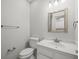 Simple bathroom featuring white vanity and a framed mirror at 4033 Priory Cir, Tampa, FL 33618