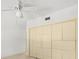 Bright bedroom with ample closet space and a ceiling fan at 4033 Priory Cir, Tampa, FL 33618