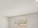 Bedroom with shuttered windows and overhead lighting at 4033 Priory Cir, Tampa, FL 33618
