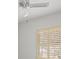 Bright bedroom with shutters and ceiling fan at 4033 Priory Cir, Tampa, FL 33618