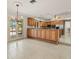 Bright dining area with tiled floor and french doors to the outside at 4033 Priory Cir, Tampa, FL 33618